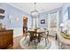 Charming dining room with hardwood floors and a view of the kitchen at 1246 Gold Rush Ct, Fort Mill, SC 29708