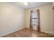 Bedroom with window, ceiling fan, and patterned curtains at 202 Mountain View Dr, Taylorsville, NC 28681