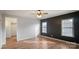 Bedroom with hardwood floors, neutral walls, and closet at 202 Mountain View Dr, Taylorsville, NC 28681