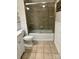 Well-kept bathroom showcases a tiled shower with glass doors and updated fixtures at 2518 Cranbrook Ln, Charlotte, NC 28207