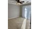 Comfortable carpeted bedroom bathed in natural light from a large glass door at 2518 Cranbrook Ln, Charlotte, NC 28207