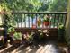 Private balcony with lush potted plants and city views at 325 Queens Rd # 15, Charlotte, NC 28204