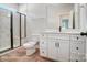 Modern bathroom with white vanity, marble shower, and tile flooring at 3252 Mcharney Dr # 37, Harrisburg, NC 28075