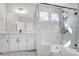 Bathroom featuring a large shower, marble tile, and a modern vanity at 3252 Mcharney Dr # 37, Harrisburg, NC 28075