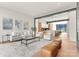 Open-concept living room with views to the modern kitchen and fireplace at 4026 Chevington Rd # 102, Charlotte, NC 28226