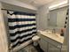 Bathroom with shower/tub combo at 5824 Crossing King Dr, Charlotte, NC 28212