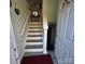 Stairs leading to the upper level at 5824 Crossing King Dr, Charlotte, NC 28212