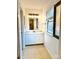 Bathroom with quartz countertop and modern vanity at 6130 Heathstone Ln, Charlotte, NC 28210