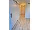 Entryway with light wood floors and barn door at 6130 Heathstone Ln, Charlotte, NC 28210