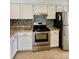 Modern kitchen with granite countertops and stainless steel appliances at 6130 Heathstone Ln, Charlotte, NC 28210