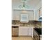 Modern kitchen with granite countertops and white cabinets at 6130 Heathstone Ln, Charlotte, NC 28210