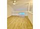 Spacious loft area with hardwood floors at 6130 Heathstone Ln, Charlotte, NC 28210