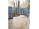 Small fenced patio area with concrete slab at 6130 Heathstone Ln, Charlotte, NC 28210