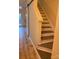 Interior stairs with barn door and light wood floors at 6130 Heathstone Ln, Charlotte, NC 28210