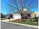 House exterior showcasing a ranch style home with a neat lawn and driveway at 1001 Jessica Ln, Matthews, NC 28104