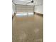 Newly finished garage floor with epoxy coating. Durable and easy-to-clean at 1001 Jessica Ln, Matthews, NC 28104