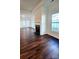 Living room with hardwood floors, fireplace and french doors at 1001 Jessica Ln, Matthews, NC 28104