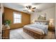 Cozy bedroom with a large bed and beautiful artwork at 110 Yorktowne St, Fort Mill, SC 29715