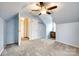 Bonus room with blue walls, closet, and neutral carpet at 110 Yorktowne St, Fort Mill, SC 29715