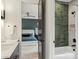 Modern bathroom leading to a bedroom, featuring stylish tile and sleek fixtures at 116 Hunt Camp Trl # 11, Davidson, NC 28036