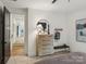 Bedroom view of dresser and mirror with a glimpse into the hallway at 116 Hunt Camp Trl # 11, Davidson, NC 28036