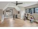 Bright home gym with hardwood floors, a ceiling fan, and lots of natural light at 116 Hunt Camp Trl # 11, Davidson, NC 28036