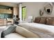 Modern main bedroom with a small kitchenette and round table creates a convenient and stylish retreat at 116 Hunt Camp Trl # 11, Davidson, NC 28036
