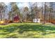 Large backyard with playset, shed and wooden fence at 3116 S Legacy Park Blvd, Fort Mill, SC 29707