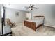 Bedroom with a double bed, rocking chair, and ceiling fan at 3116 S Legacy Park Blvd, Fort Mill, SC 29707