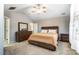 Bright bedroom with a double bed, dresser, and ceiling fan at 3116 S Legacy Park Blvd, Fort Mill, SC 29707