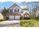 Two-story brick and vinyl home with a two-car garage and well-manicured lawn at 3116 S Legacy Park Blvd, Fort Mill, SC 29707