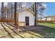 White storage shed with paver patio at 3116 S Legacy Park Blvd, Fort Mill, SC 29707