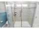 Clean and spacious shower with tile surround and glass door at 5762 Soft Shell Dr, Lancaster, SC 29720