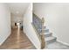 View of a staircase with a metal railing leading to the second floor at 5762 Soft Shell Dr, Lancaster, SC 29720