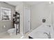 Bathroom with toilet, double vanity, and access to another room at 697 Maple Ridge Cir, Salisbury, NC 28147