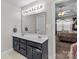 Bathroom boasts double vanity, and view into bedroom at 697 Maple Ridge Cir, Salisbury, NC 28147