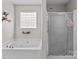 Relaxing bathroom with soaking tub and separate shower at 697 Maple Ridge Cir, Salisbury, NC 28147