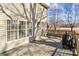 Wooden deck adjacent to house with screened porch and grill at 697 Maple Ridge Cir, Salisbury, NC 28147