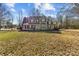 Two-story house with a large front yard covered in autumn leaves at 697 Maple Ridge Cir, Salisbury, NC 28147