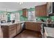 Spacious kitchen featuring wood cabinets and granite countertops at 697 Maple Ridge Cir, Salisbury, NC 28147