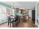 Kitchen with island, dining area, and hardwood floors at 697 Maple Ridge Cir, Salisbury, NC 28147