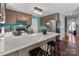 Kitchen with island, wood cabinets, and granite countertops at 697 Maple Ridge Cir, Salisbury, NC 28147