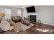 Living room with fireplace, hardwood floors, and two sofas at 697 Maple Ridge Cir, Salisbury, NC 28147