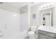 Simple bathroom with a shower/tub combo and gray vanity at 9149 Washam Potts Rd, Cornelius, NC 28031