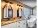 Elegant bathroom with double vanity, granite countertops, and a soaking tub at 98 Poplar Woods Dr, Concord, NC 28027