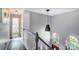 Upstairs hallway with grey walls and hardwood floors at 98 Poplar Woods Dr, Concord, NC 28027