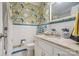 Charming bathroom with floral wallpaper, a granite vanity, and blue trim, offering a vintage feel at 1008 Candlewood Ln, Rock Hill, SC 29730