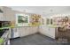 Bright kitchen with stainless appliances, ample counter space, and a modern design at 1008 Candlewood Ln, Rock Hill, SC 29730