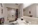 Clean bathroom with a shower/tub combo and updated vanity at 104 Woodvale Cir, Lincolnton, NC 28092