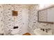 Charming bathroom with bird wallpaper and updated vanity at 104 Woodvale Cir, Lincolnton, NC 28092